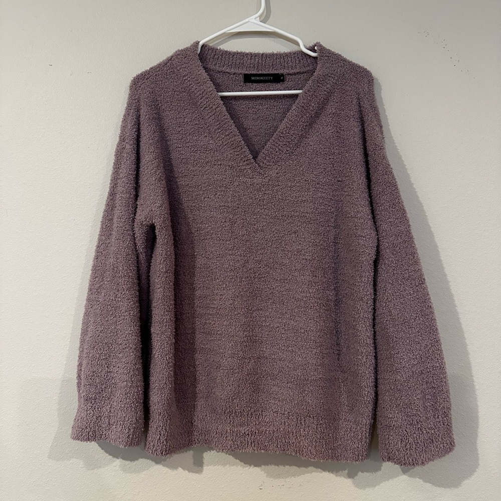 Fuzzy, soft, purple color V-neck sweater for women in size small Great condition